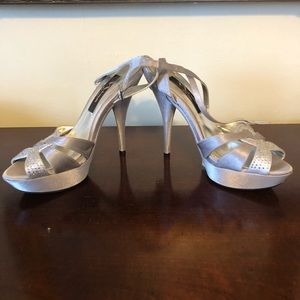Beautiful silver jeweled heels. Worn once.